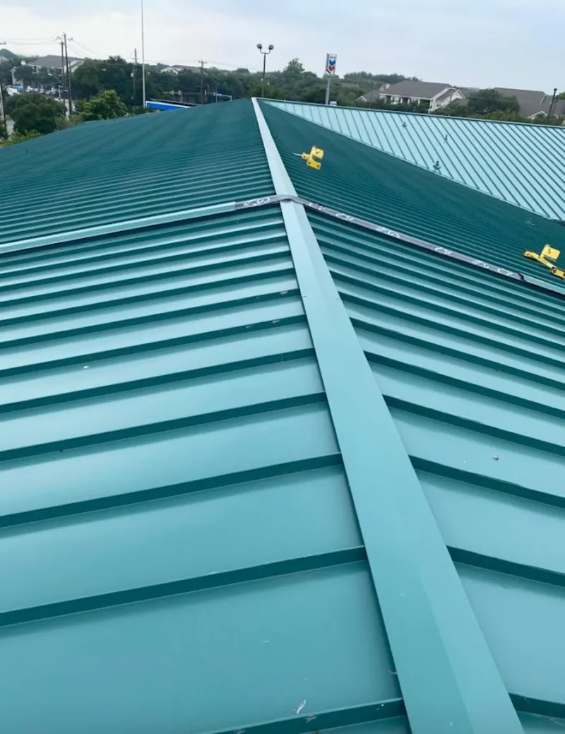 Green commercial metal roof ridge and valley for Metal Roof Repair in Sycamore